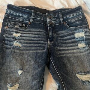 Buckle Black Distressed Blue Jeans